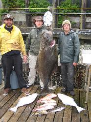 A group of 3 people fishing in BC