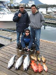 Three people fishing in BC, Canada