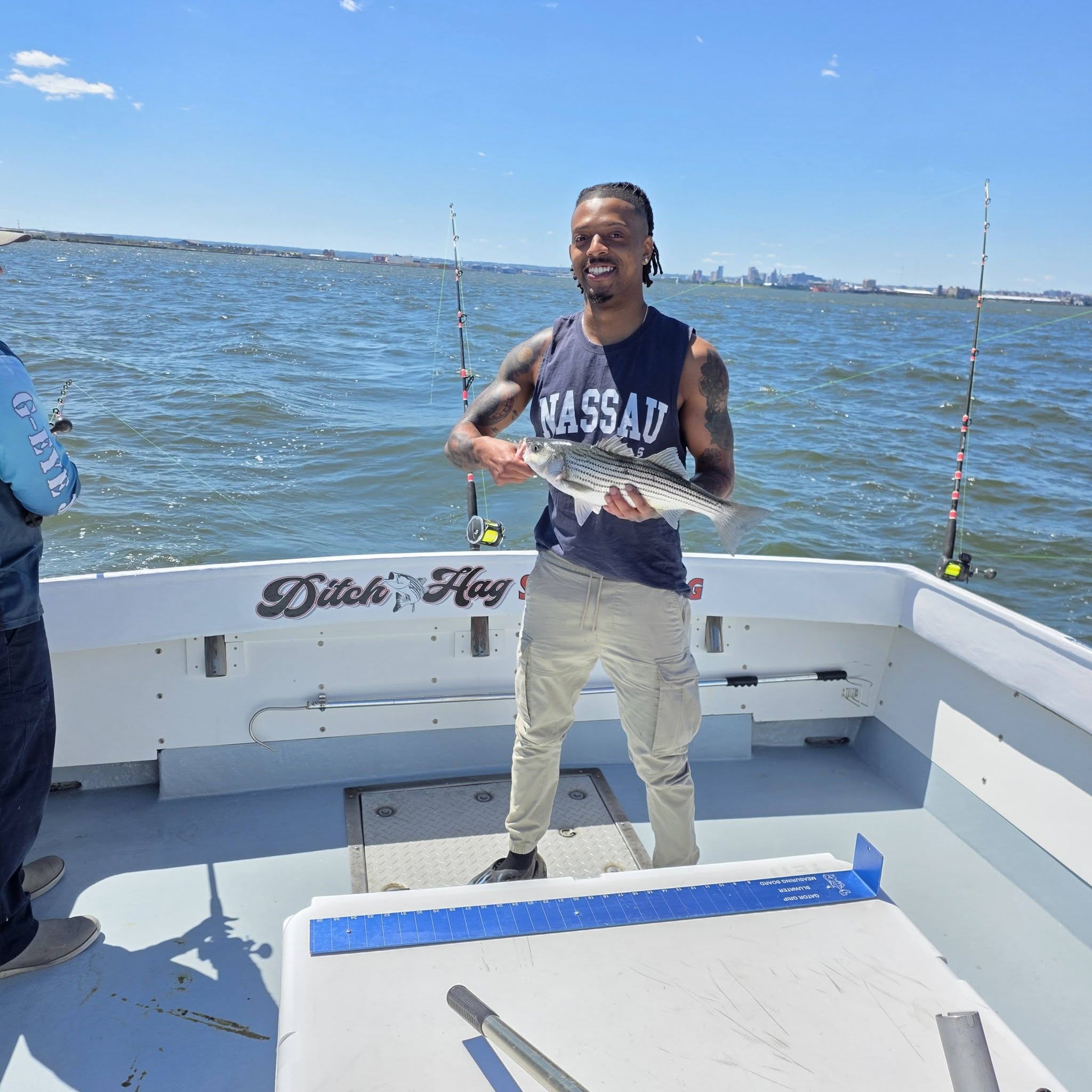 Striped bass caught during fishing charter in Baltimore MD waters