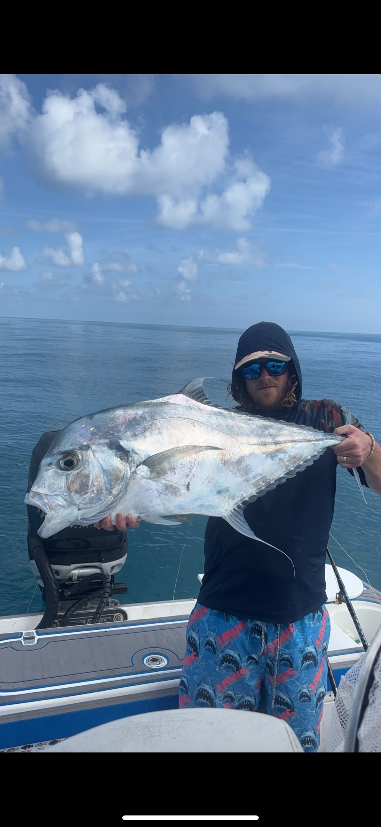 Photograph of an African Pompano, a 29-inch fish, caught while fishing in Marathon, Florida