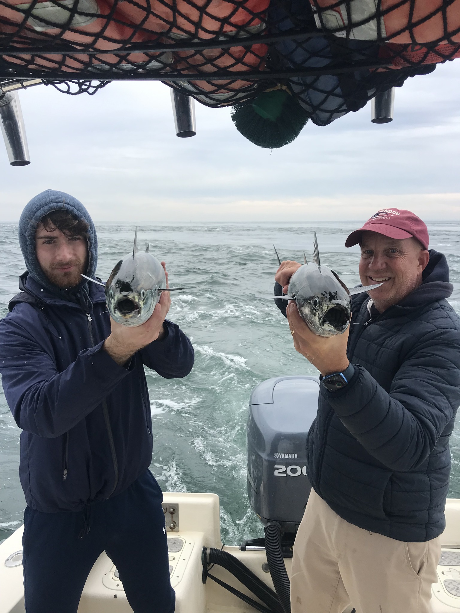 Three people fishing in Connecticut