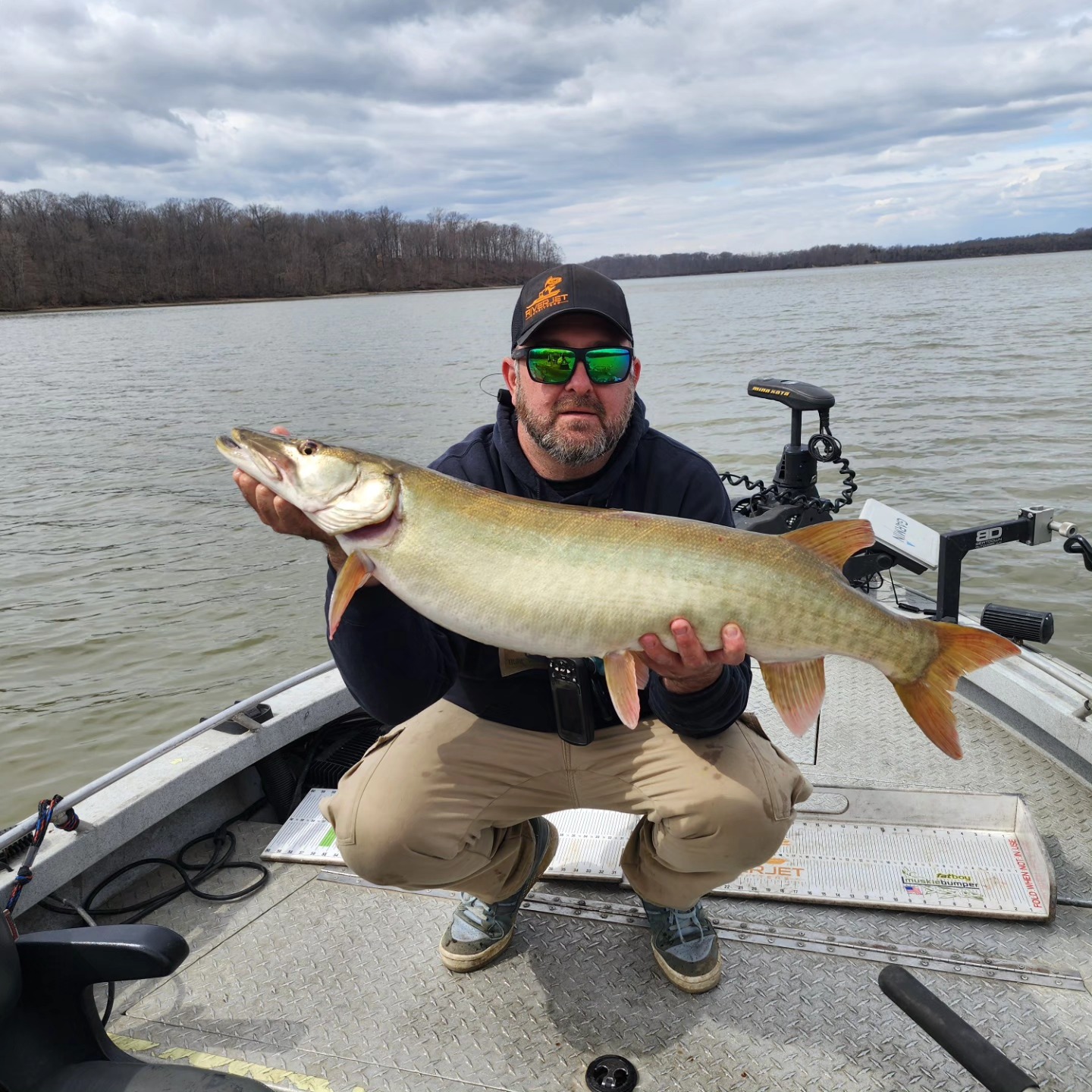 Large muskellunge fish displayed on fishing boat in Dayton OH