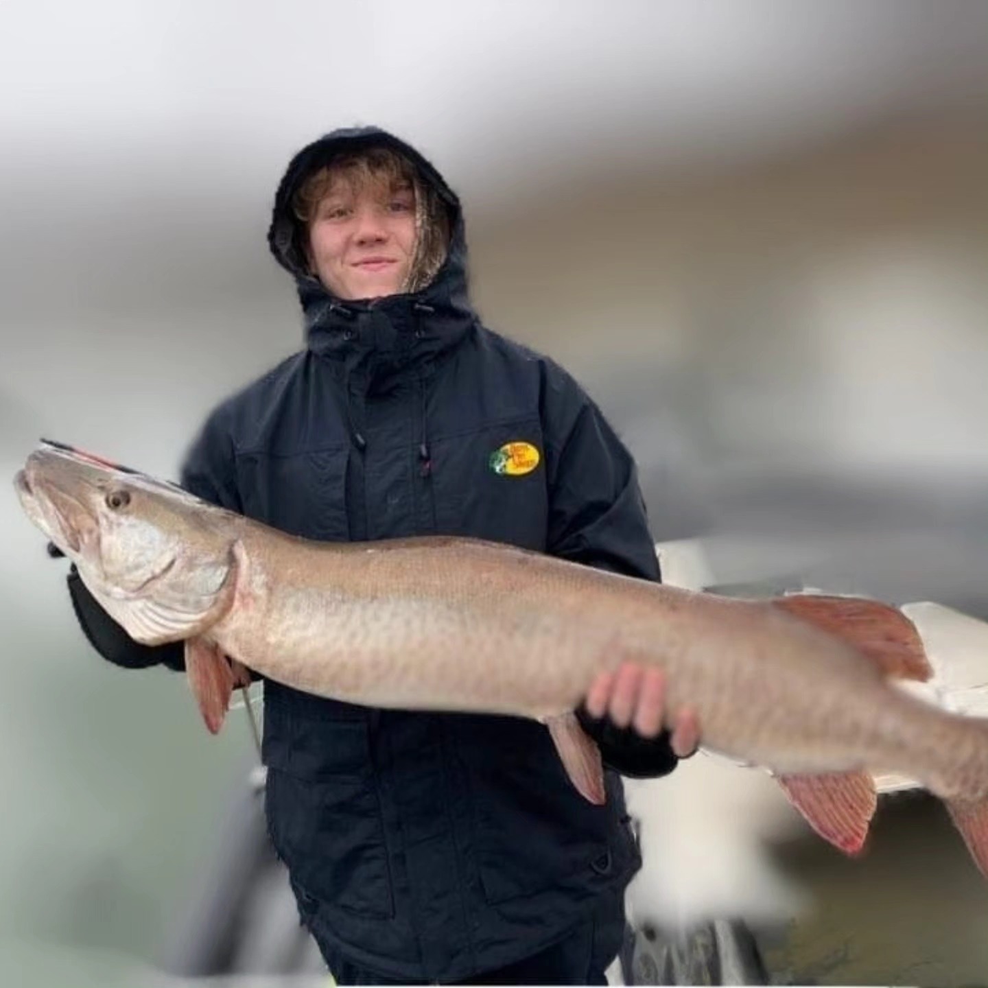 Angler holding large muskellunge fish caught in Dayton OH