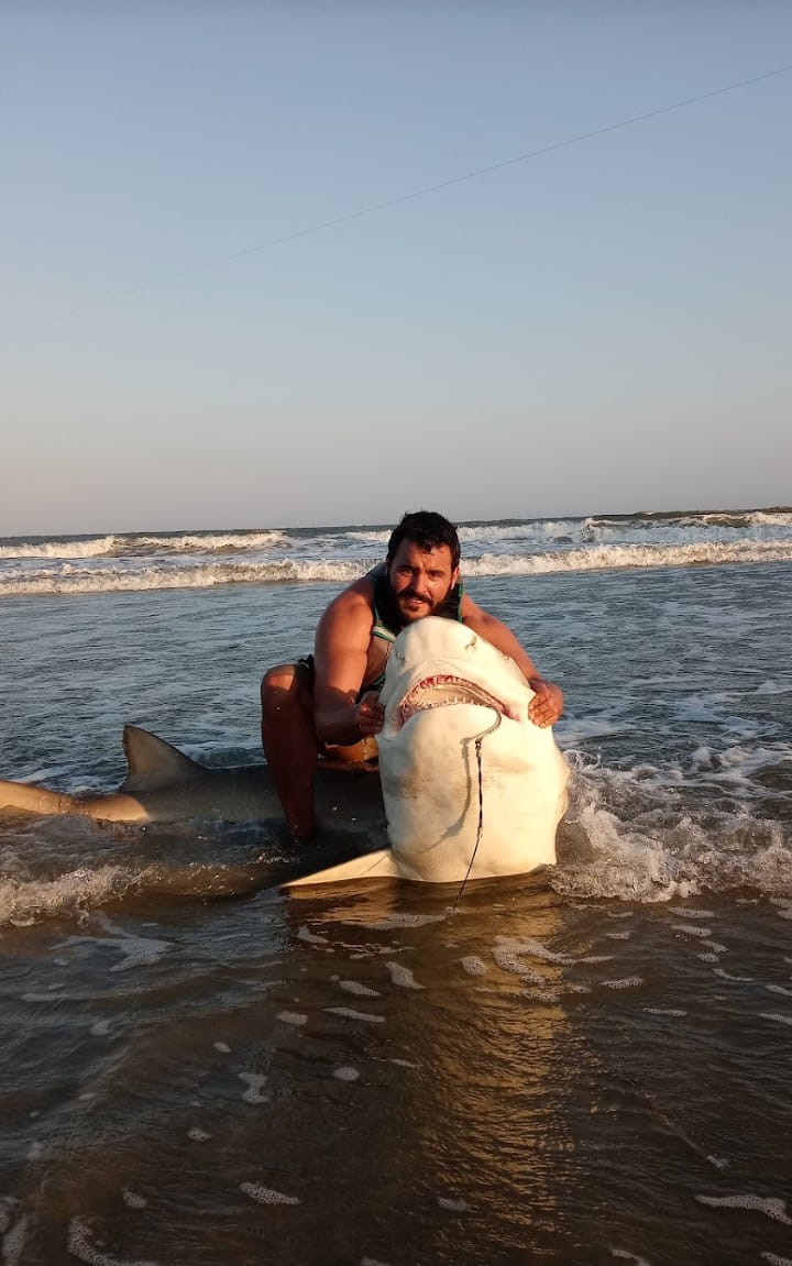 Angler fishing at Folly Beach