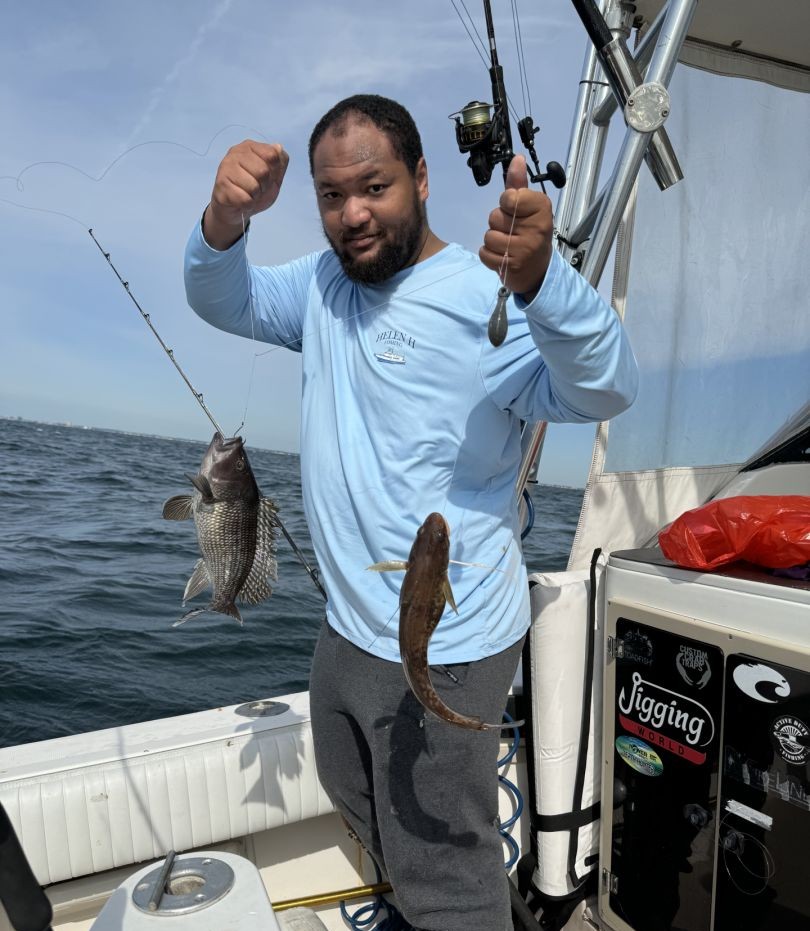 Fishing boat catch showing Black Sea Bass and eel from Neptune City NJ waters