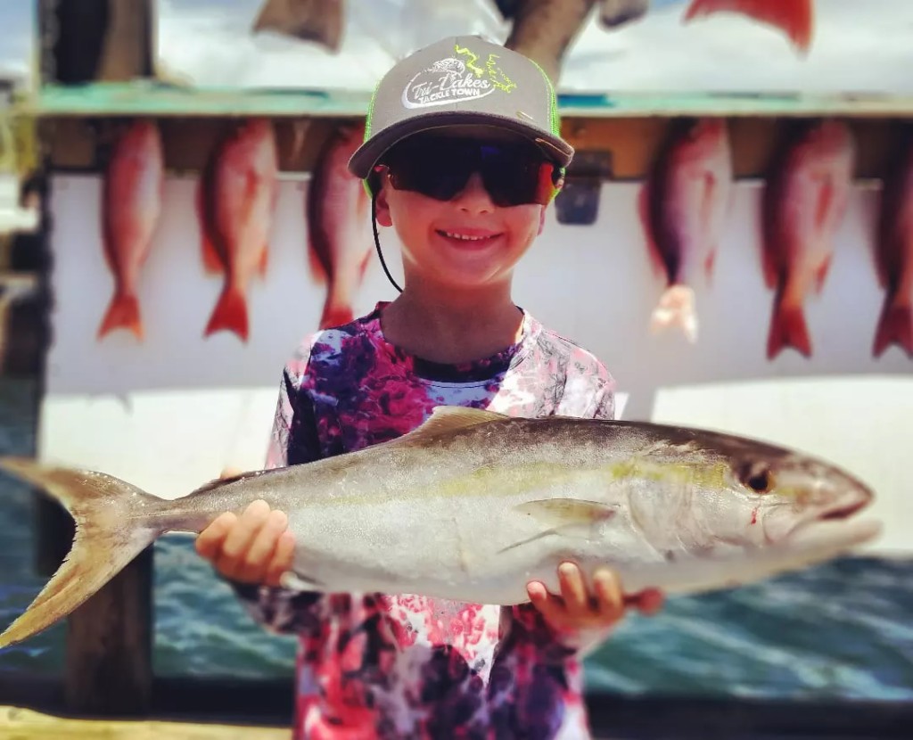Photograph of a huge greater amberjack caught while fishing in FL