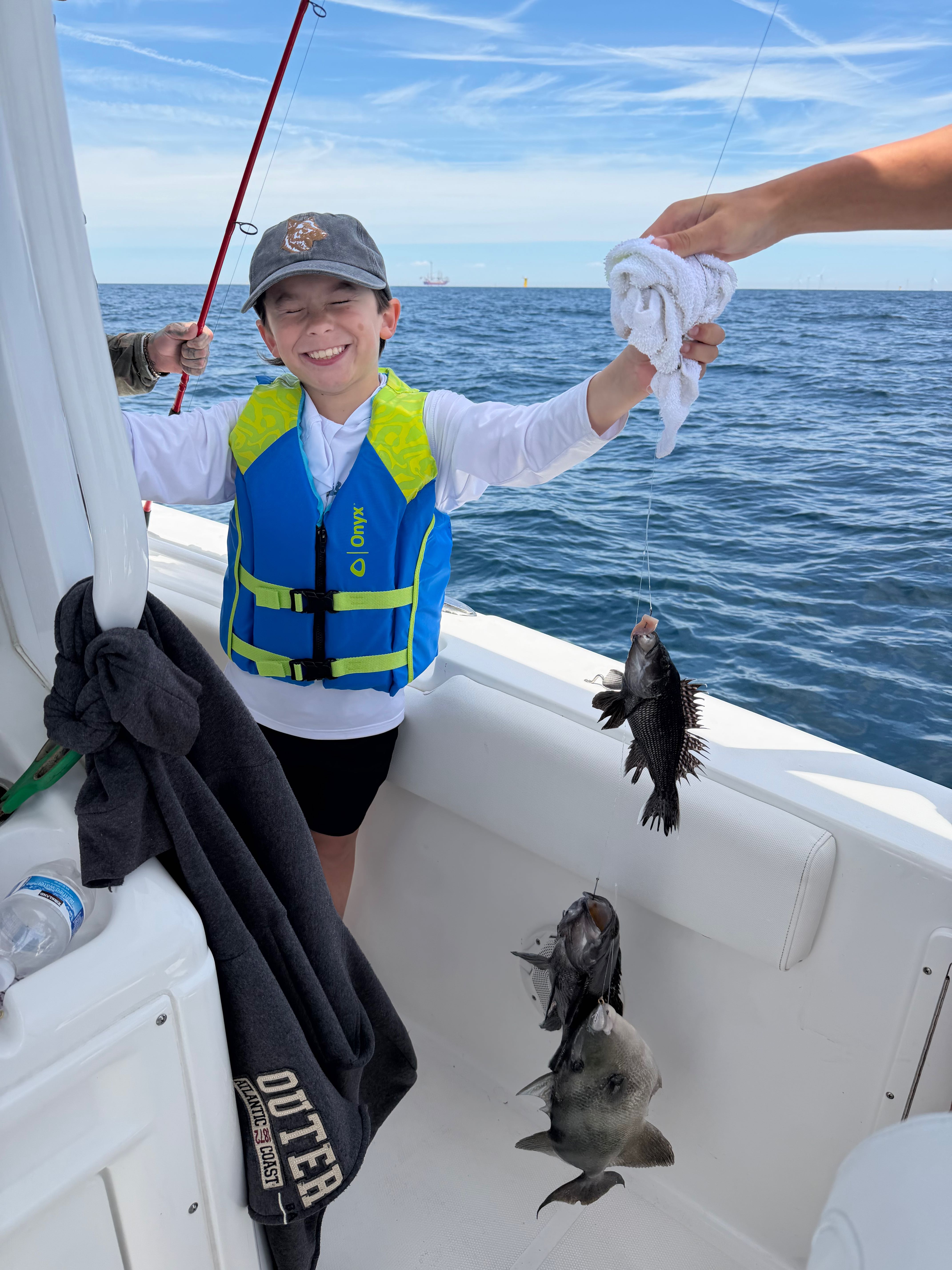 Black Sea Bass and Grey Triggerfish caught during fishing charter in Virginia Beach VA