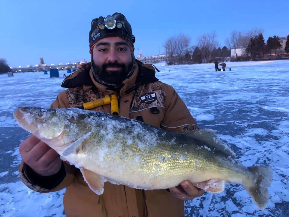 Angler with big fish in MI