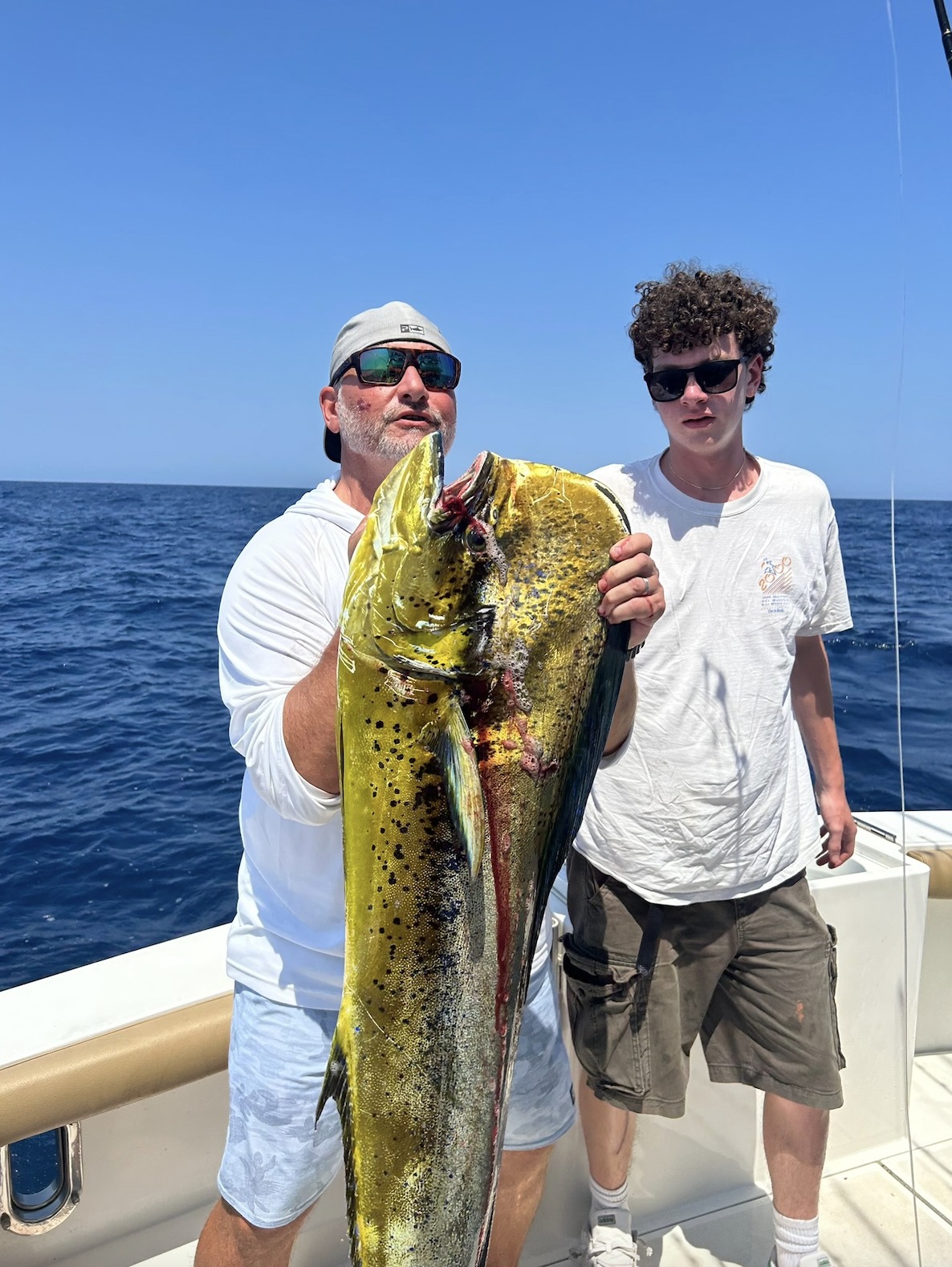 Large mahi mahi catch displayed on fishing boat in Belmar NJ waters