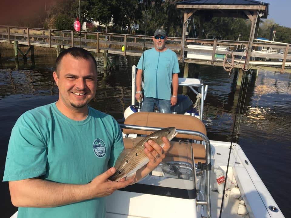 Two people in Charleston enjoying a day of fishing