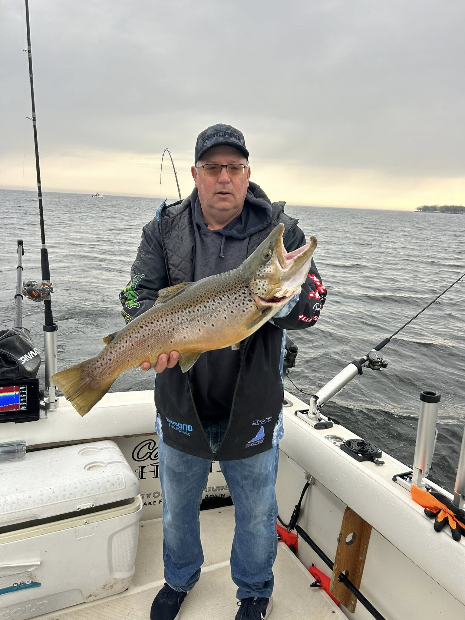 Brown trout catch displayed on fishing boat in Mexico NY