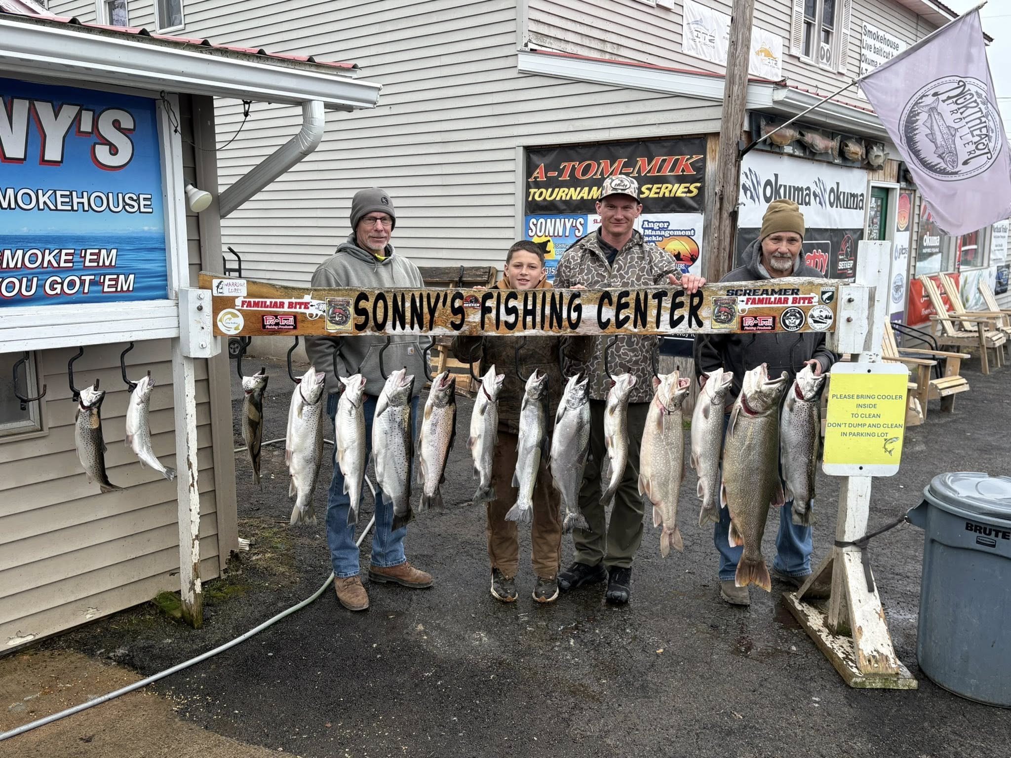 Successful fishing trip displaying multiple lake trout and rainbow trout caught in Mexico NY at Sonny's Fishing Center