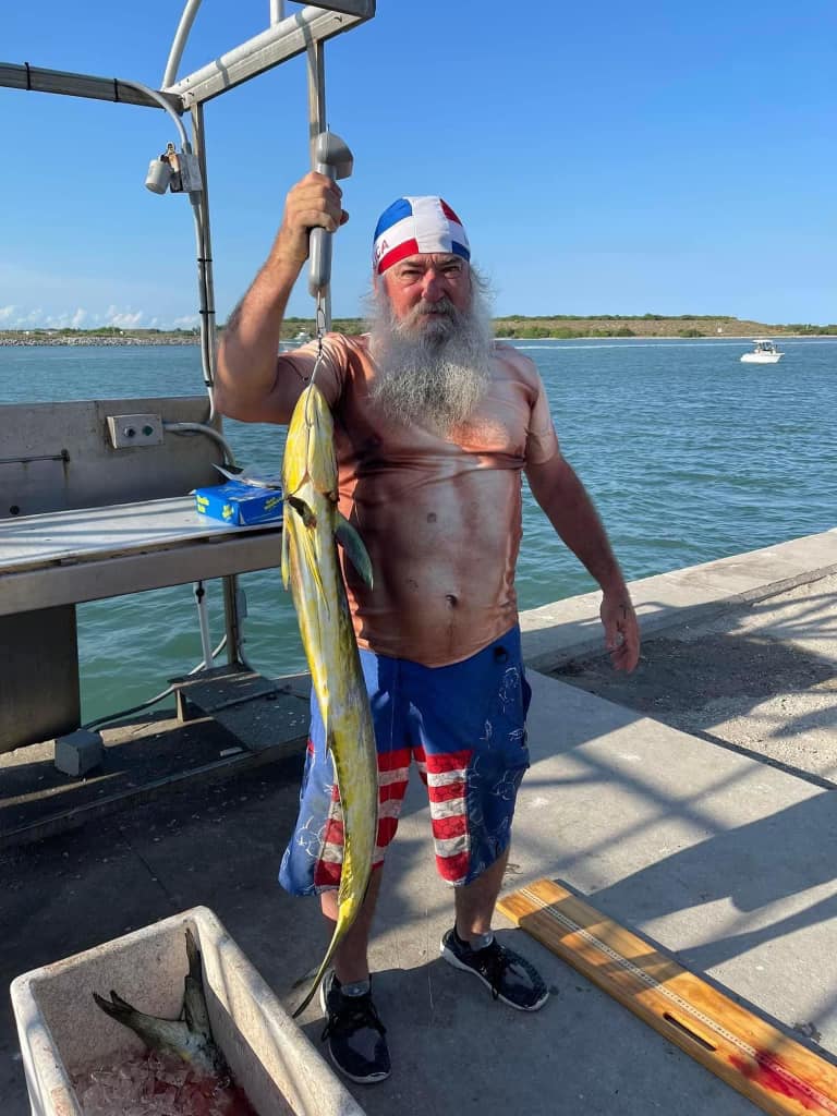 Fresh caught mahi mahi displayed on fishing boat deck