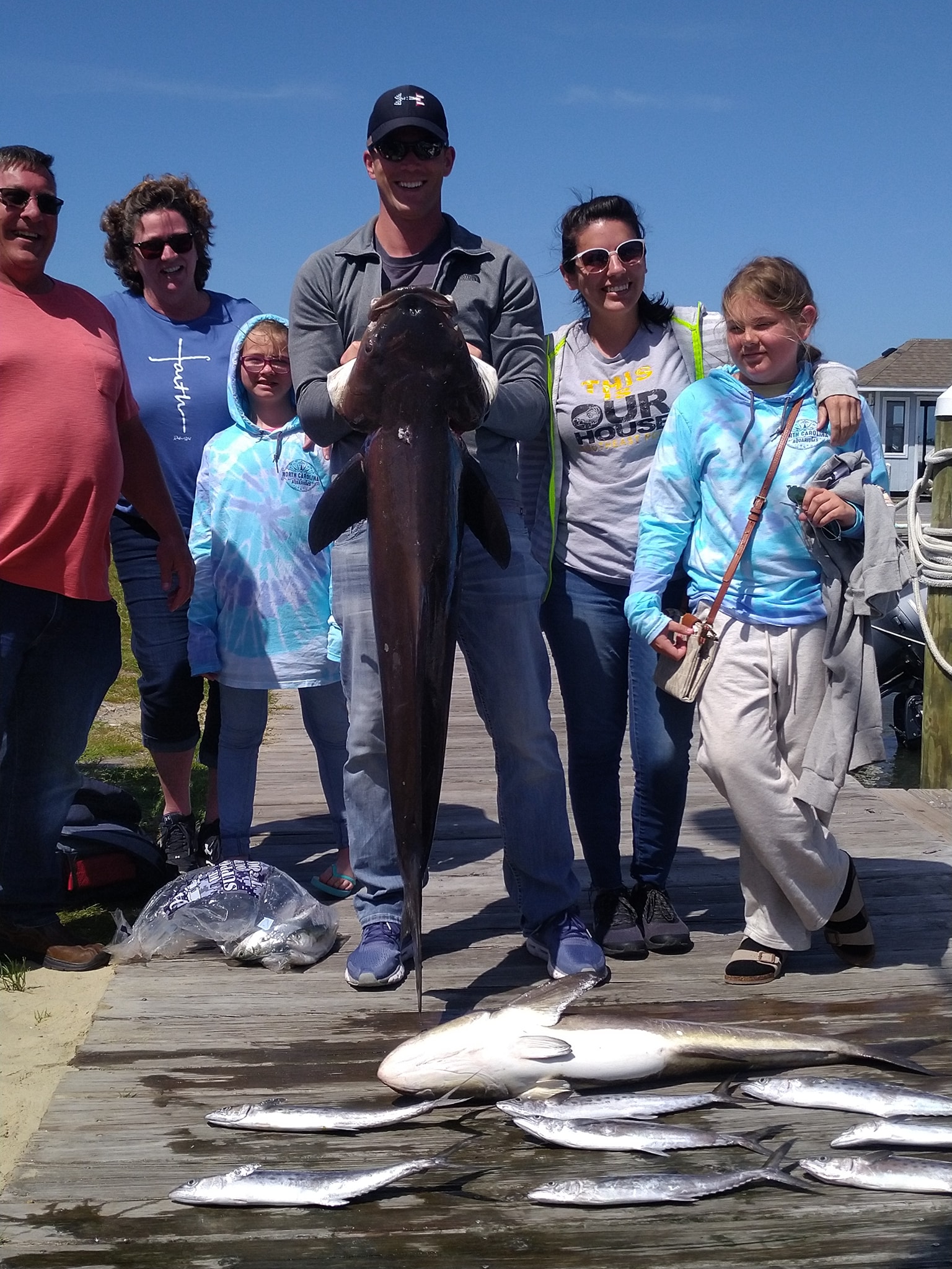 A group of 6 people fishing in Nags Head
