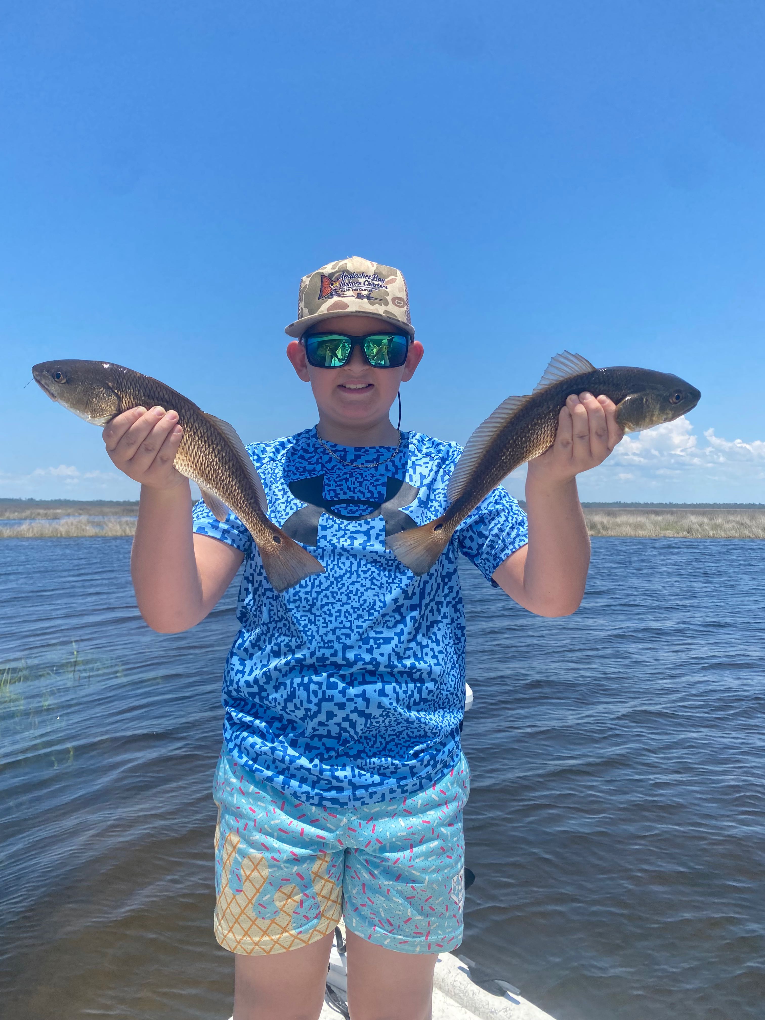 Two redfish caught during fishing trip in Tallahassee FL waters