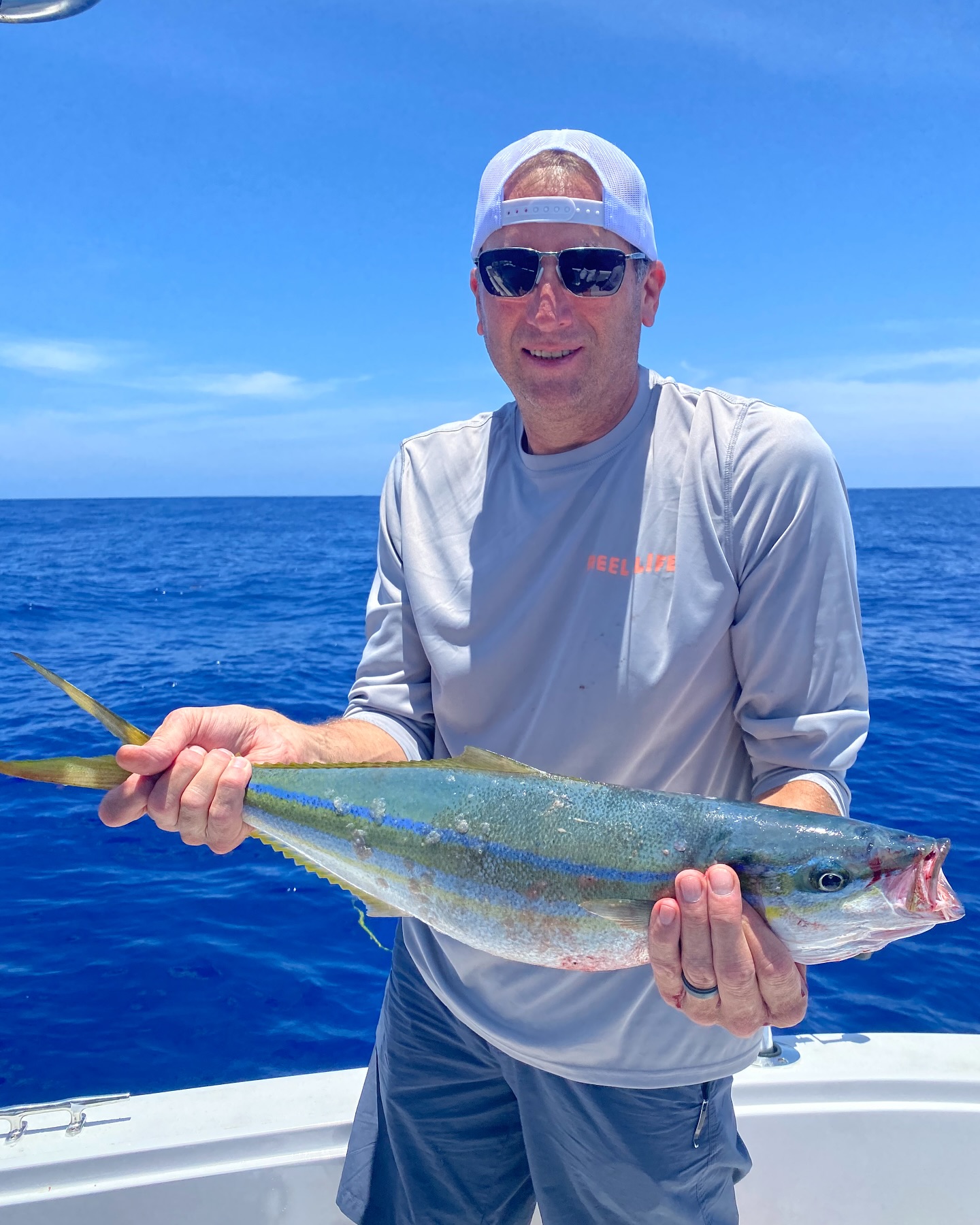 Angler with one fish caught at West Bay