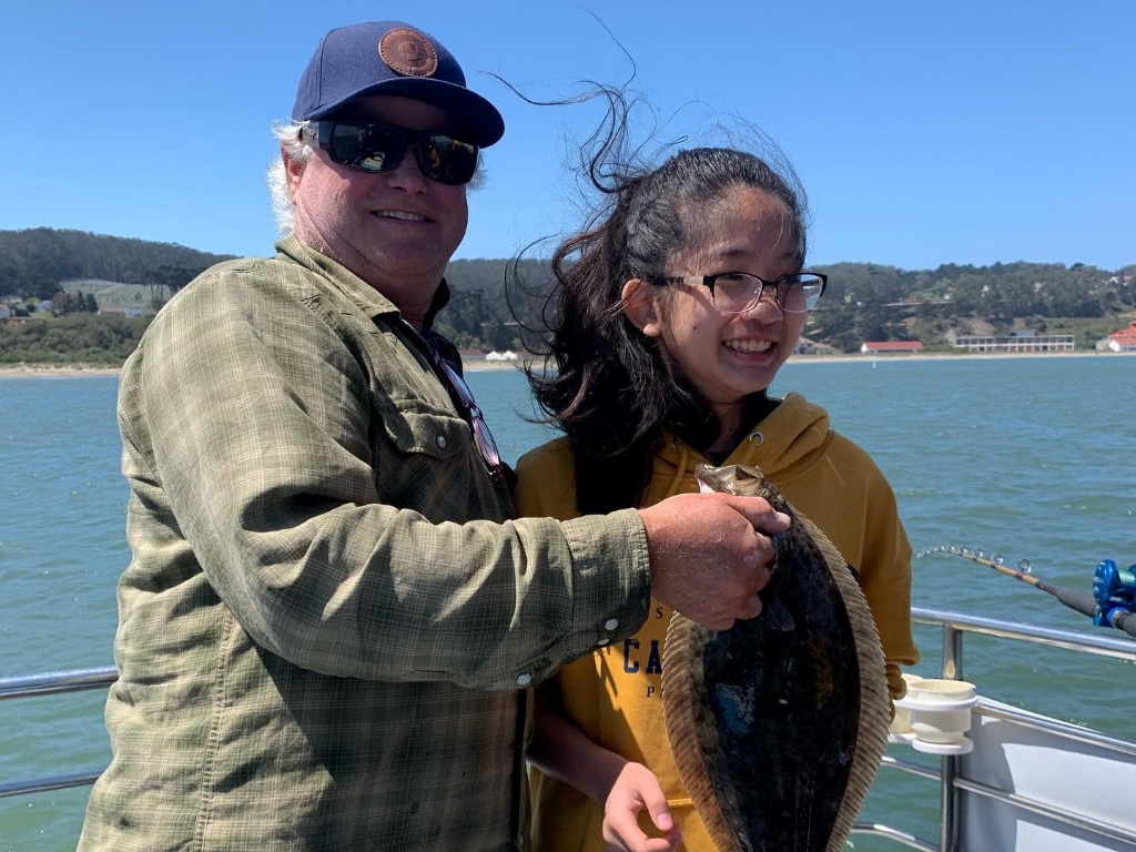 Two people enjoying fishing in San Francisco