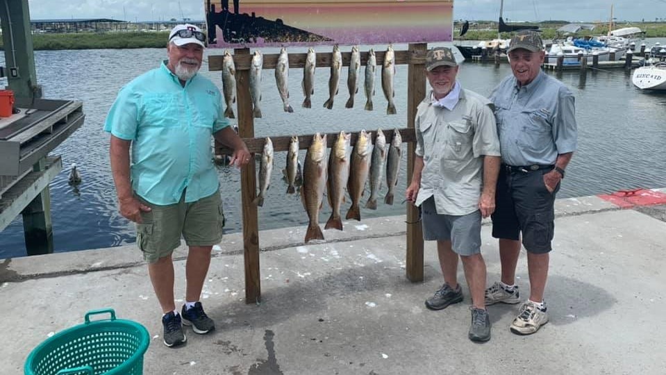 Three people fishing in Rockport