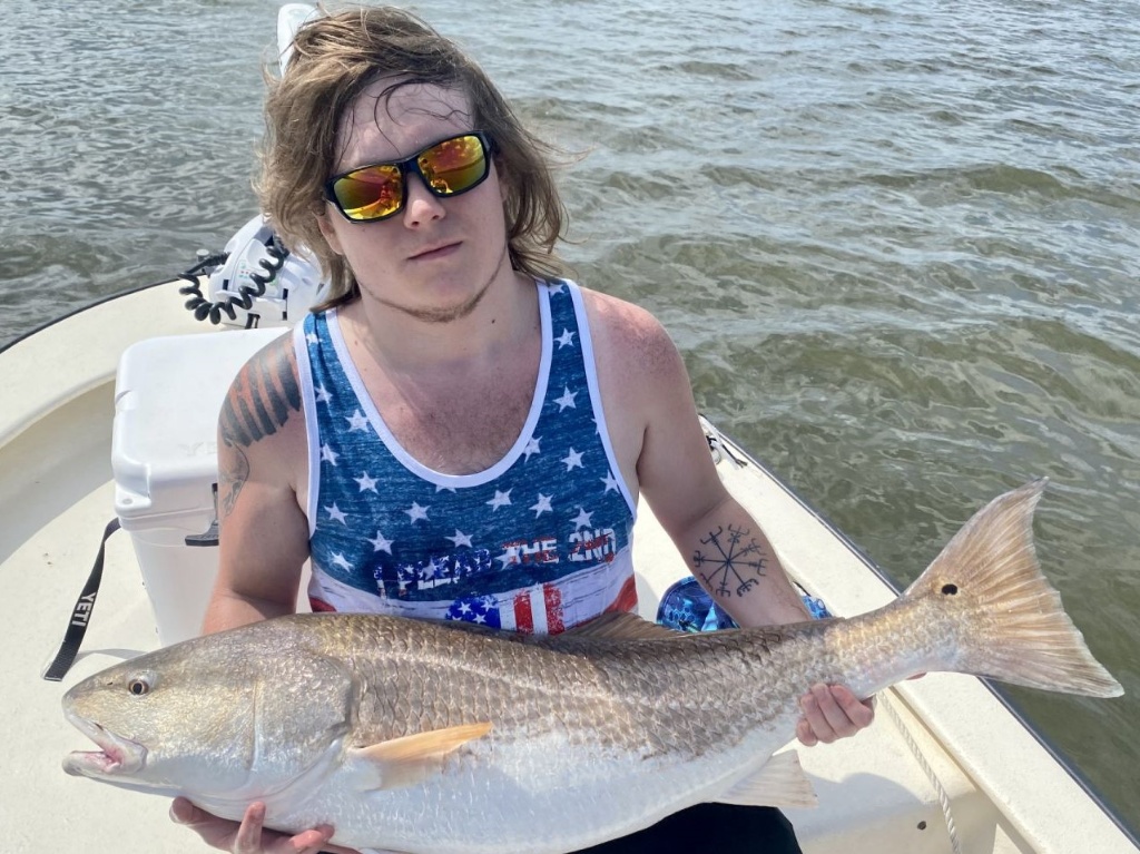 Angler with a 25-inch catch in Edgewater
