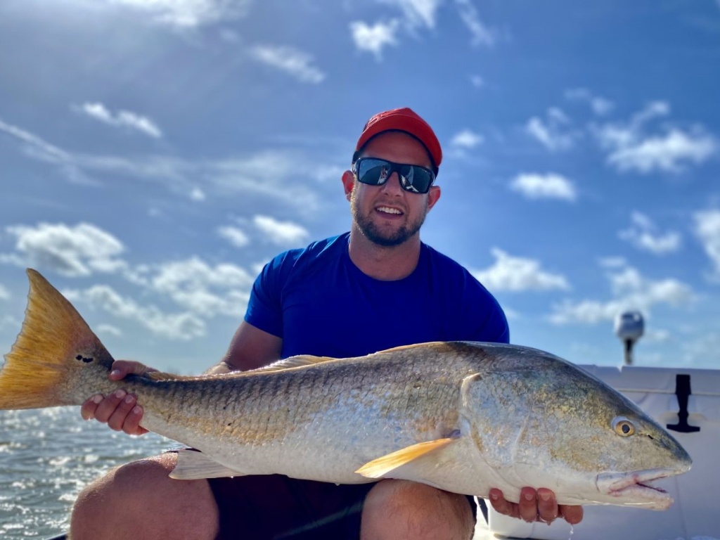 Photograph of a single redfish measuring 38 inches, caught in Edgewater