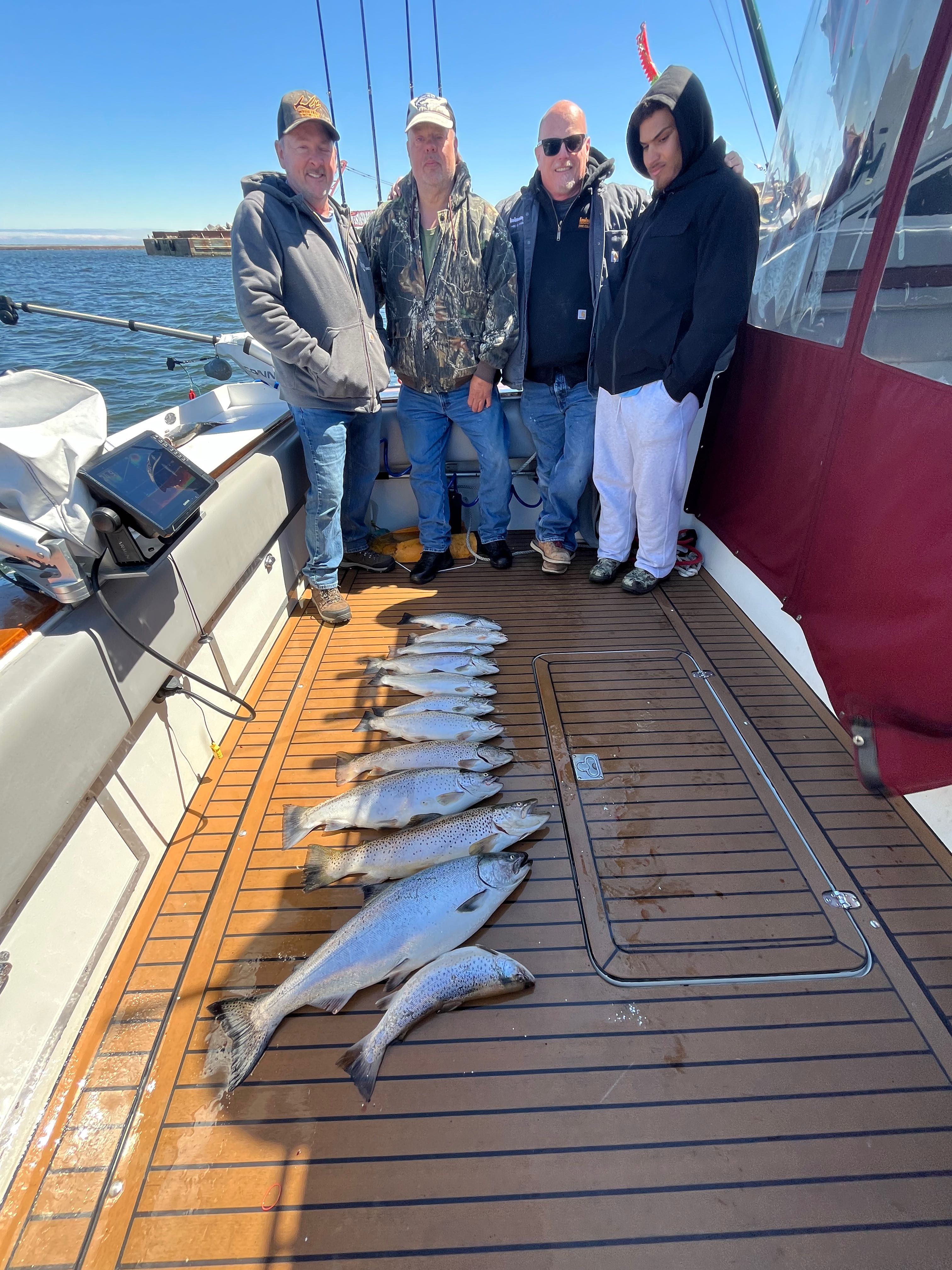 Atlantic salmon catch displayed on boat deck at Sodus Point NY fishing charter
