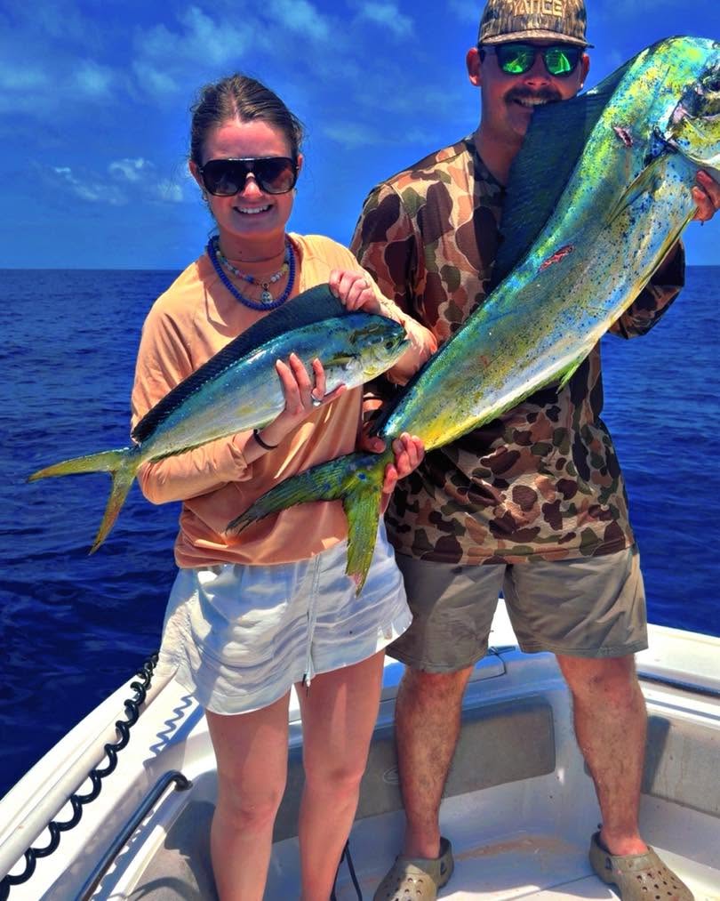 Two fresh caught mahi mahi displayed on fishing boat in Mount Pleasant SC
