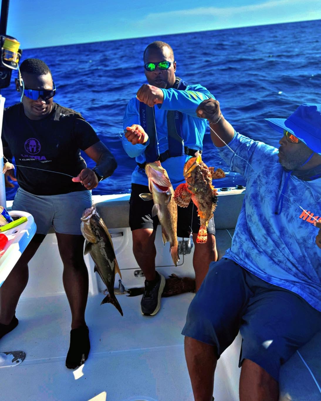 Successful fishing trip in Mount Pleasant SC with multiple fish species caught on boat deck
