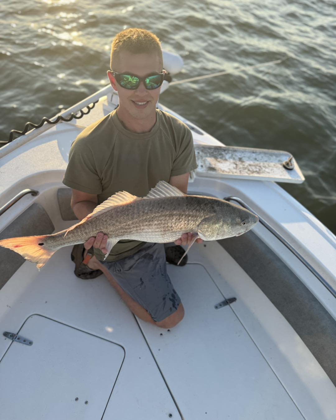 A redfish caught by a person in Mount Pleasant