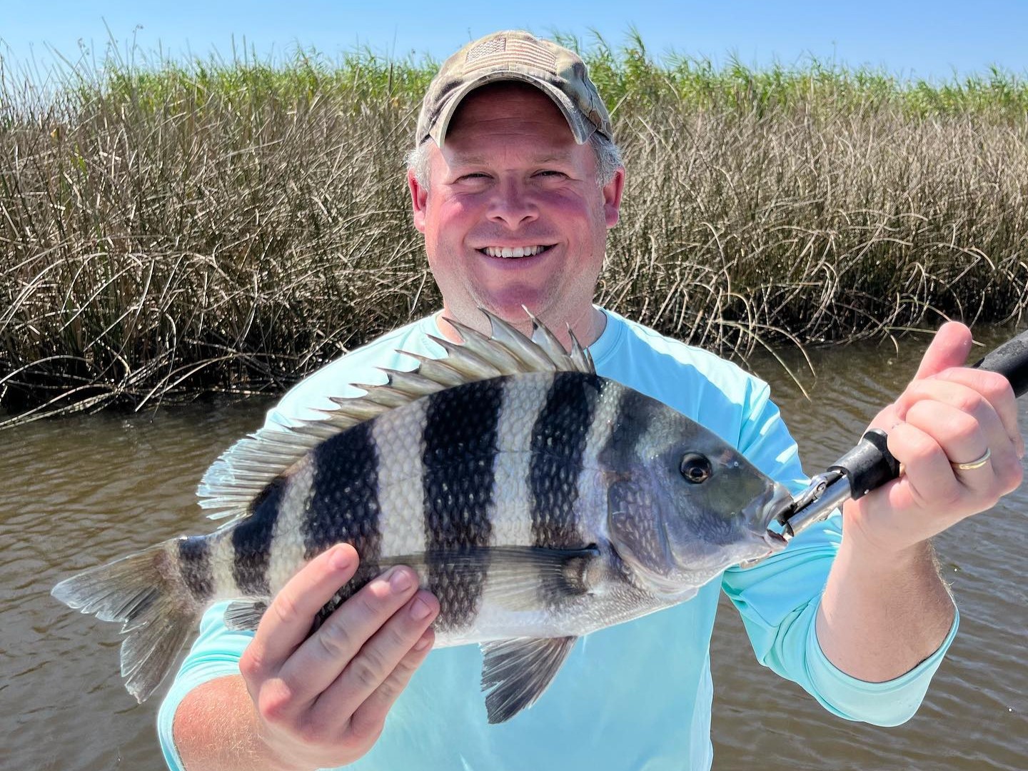 A man fishing for a Sheepshead fish in Florida