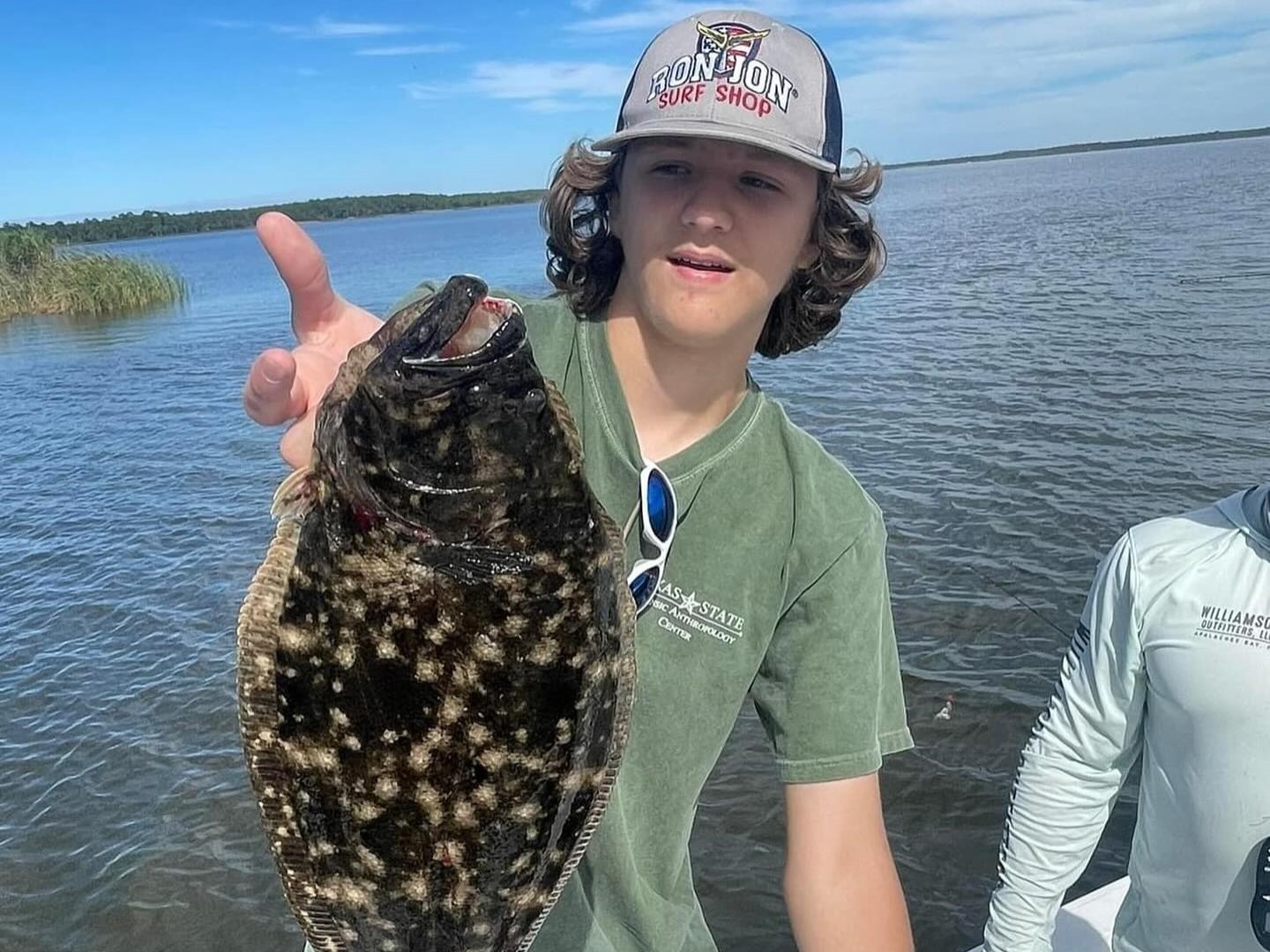 One summer flounder fish caught in Apalachicola by a person fishing