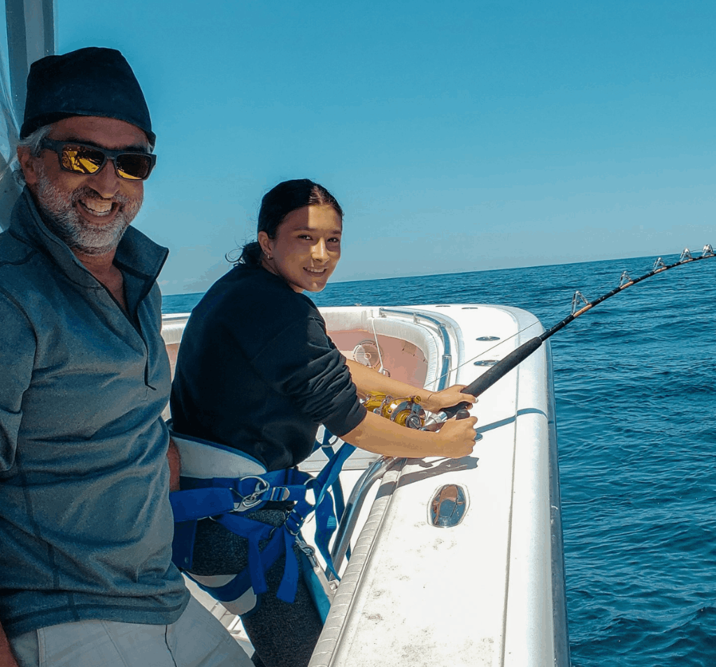 Two people fishing in Rye