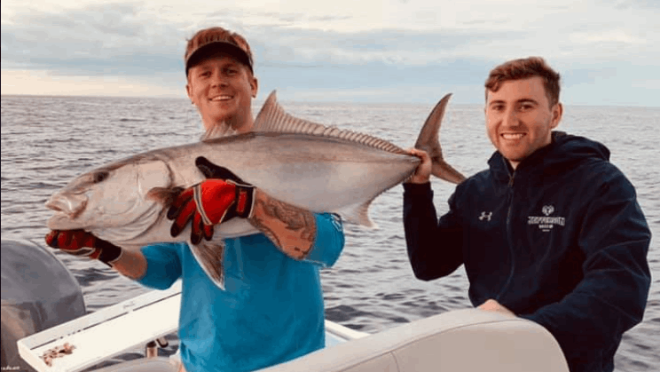 A photo of two people fishing in SC