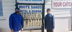 Two people fishing in TX
