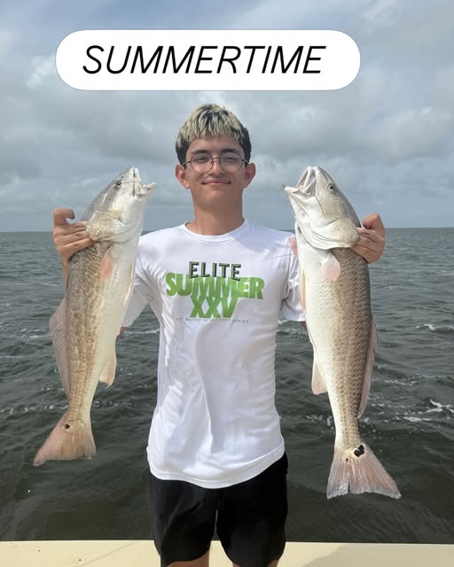 Two redfish caught fishing in Port Mansfield TX during summertime