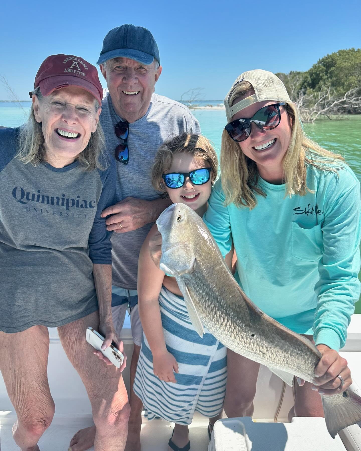 4 people fishing in Clearwater