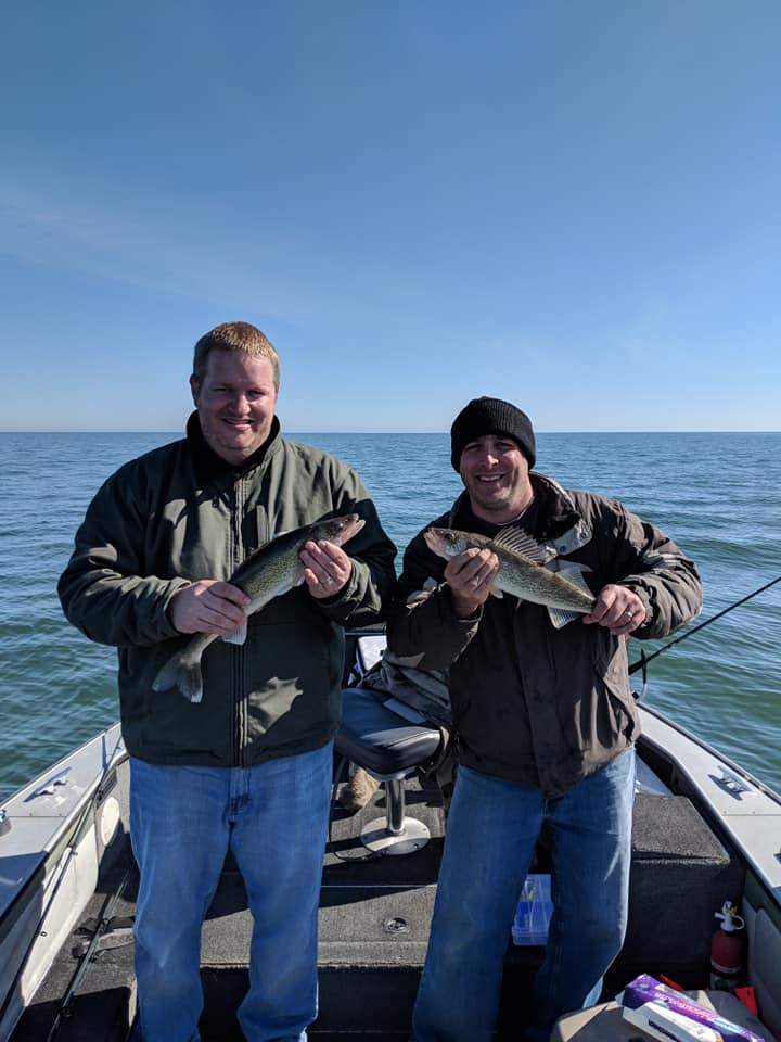 Two anglers fishing in Saginaw Bay