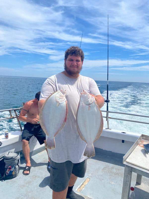 Two Southern Flounder fish caught while fishing in NJ