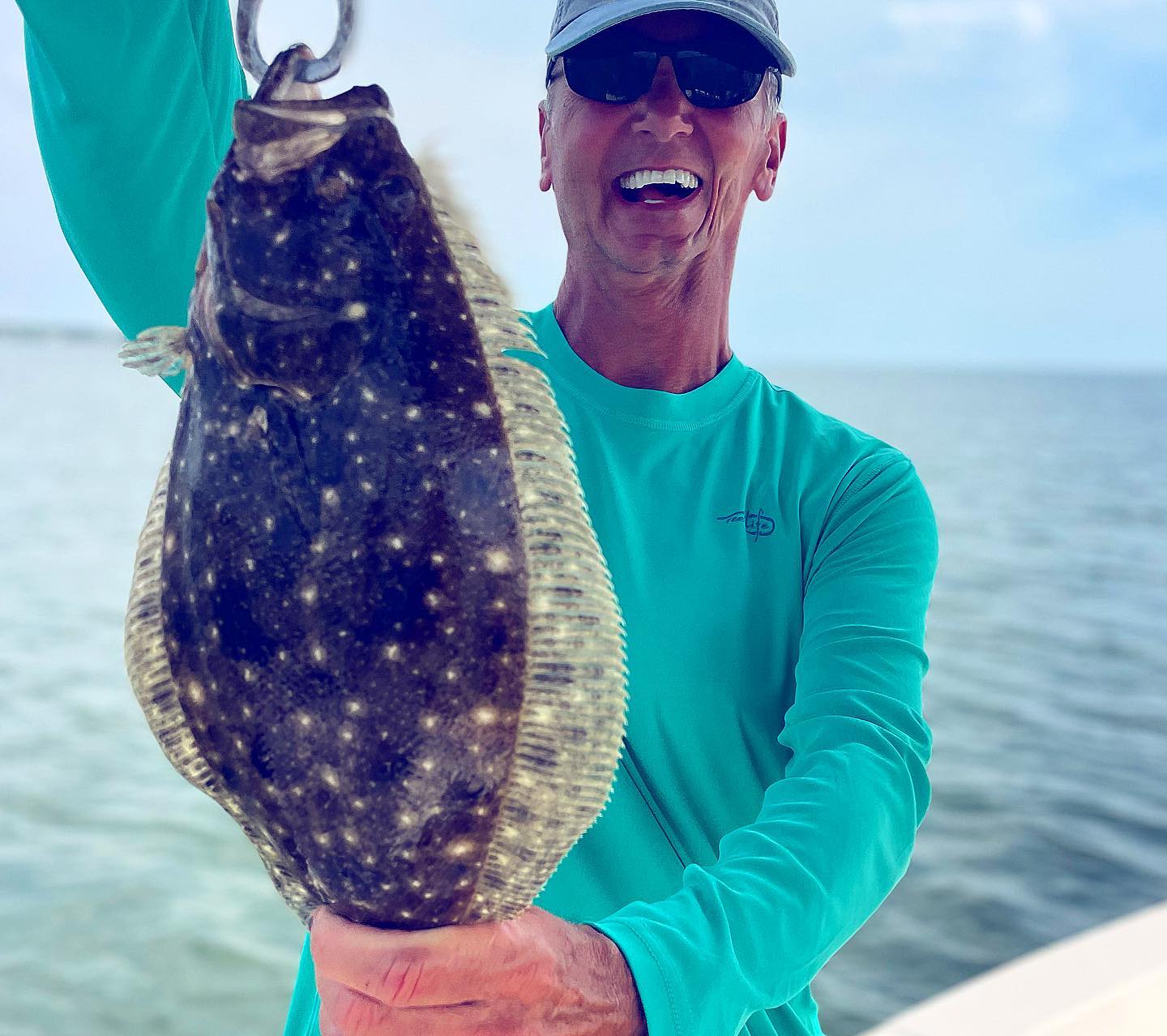 Angler with a catch in Port St. Joe