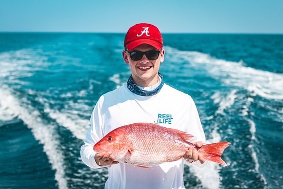 Angler with 18-inch fish in Florida