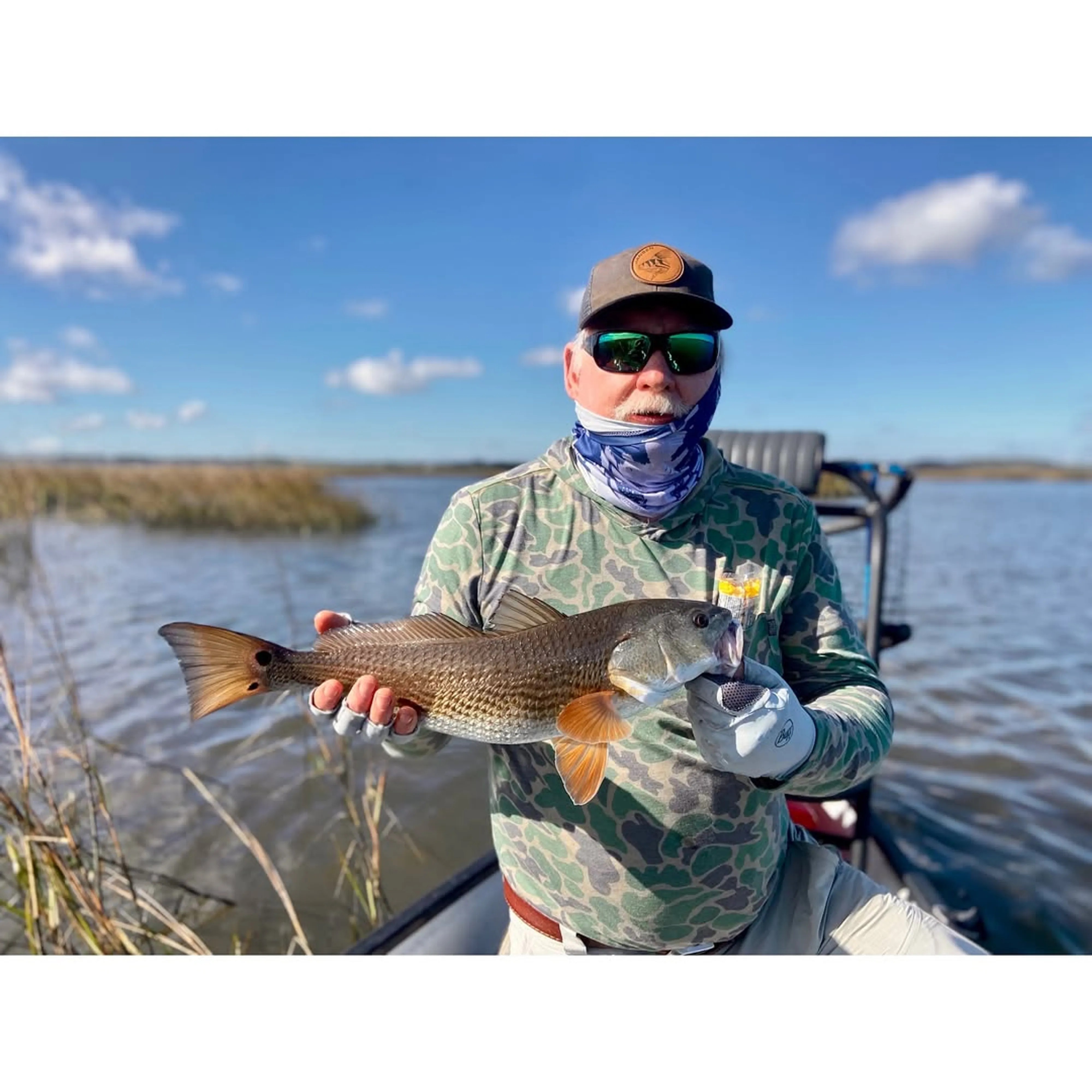 Advanced fly fishing guide with redfish on St. Augustine flats - half day inshore charter trip
