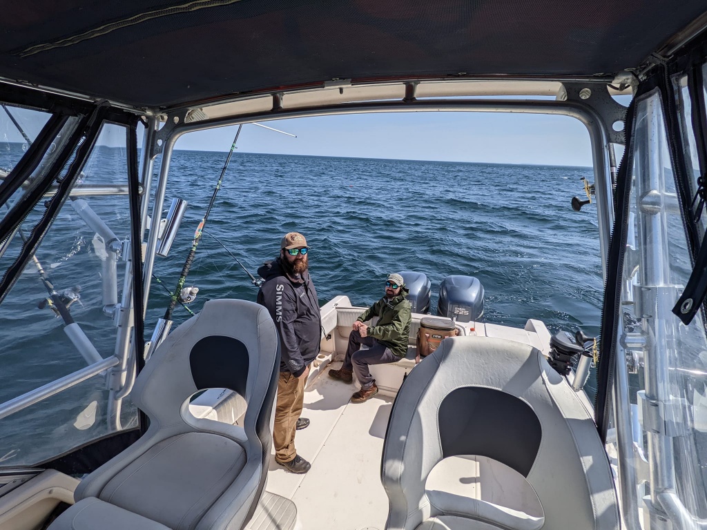 Two people fishing in MI