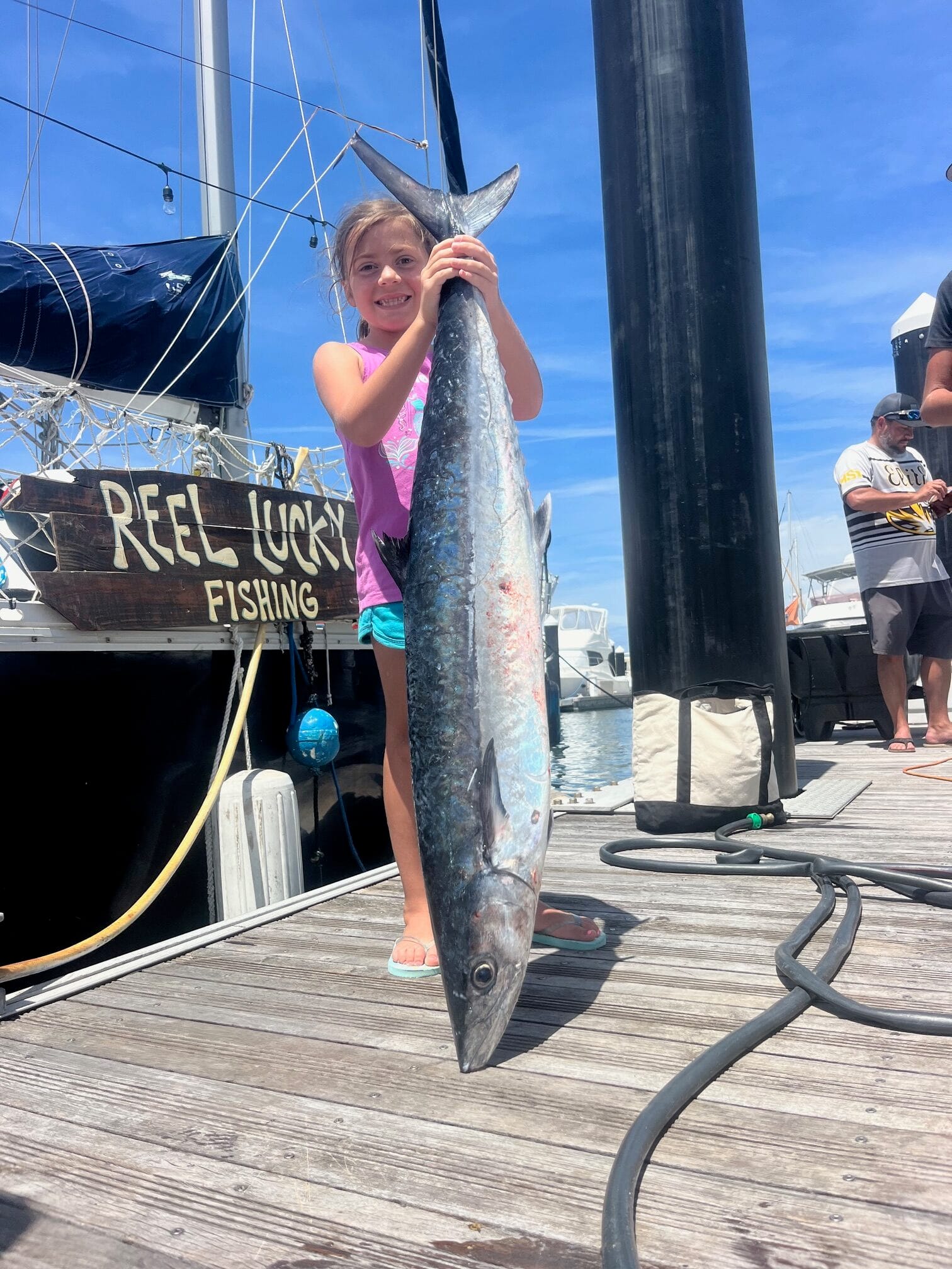 King mackerel catch displayed on fishing dock in West Palm Beach Florida