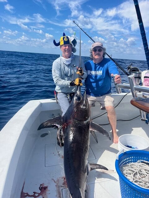 Deep sea fishing boat heading to Gulf Stream waters for swordfish charter in West Palm Beach