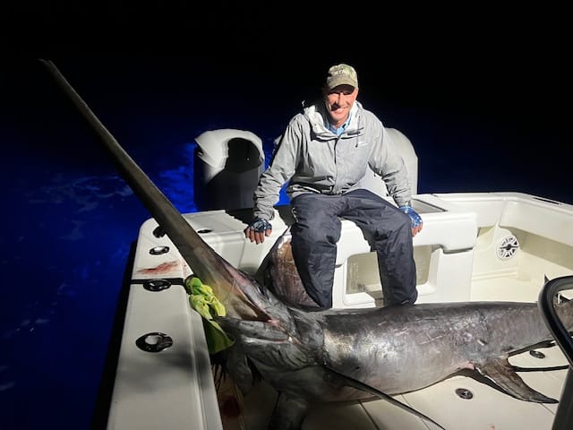 Night swordfish fishing charter boat in West Palm Beach FL offshore waters with Captain Tore