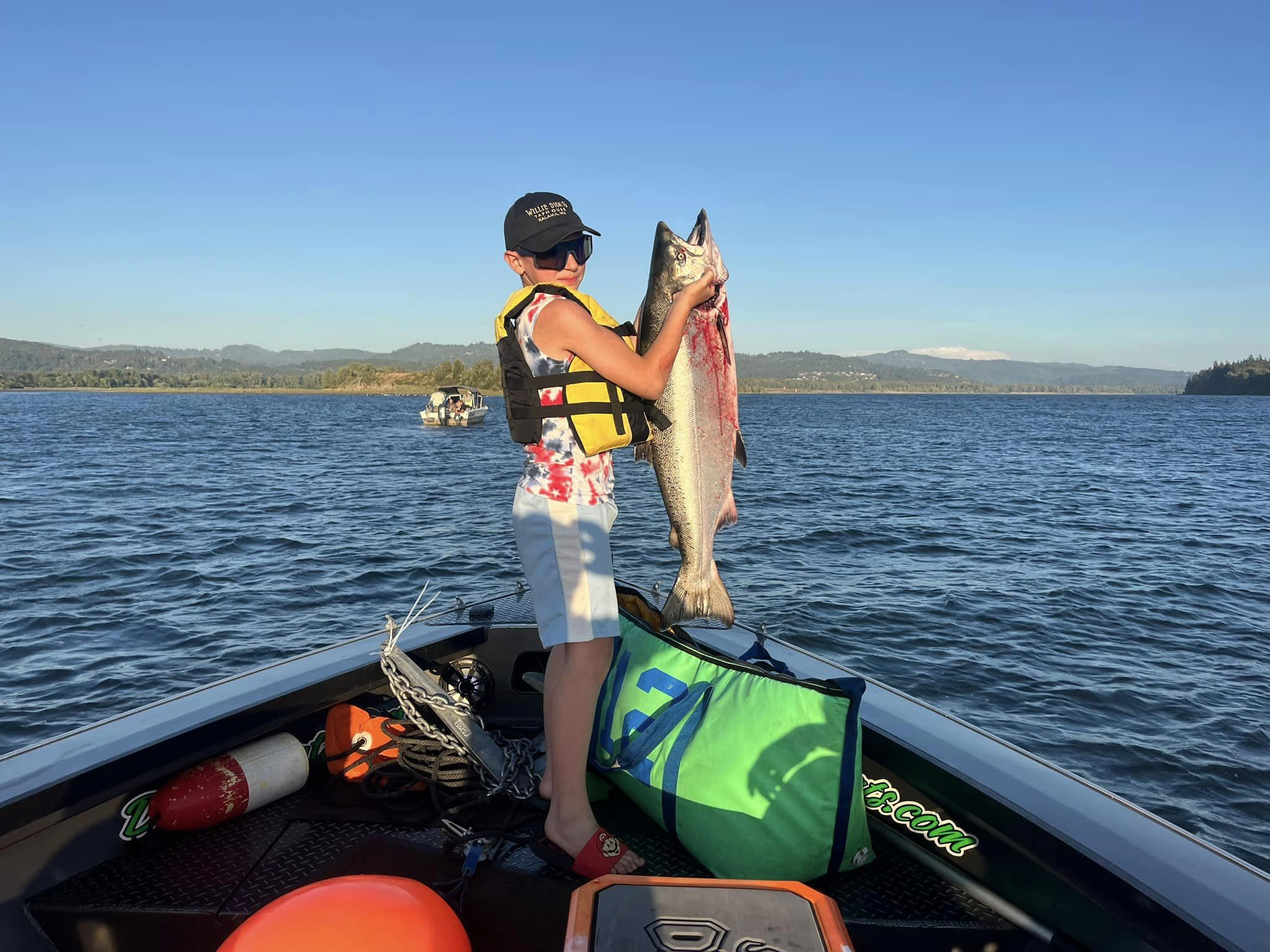 Angler with a 28-inch fish caught while fishing in WA