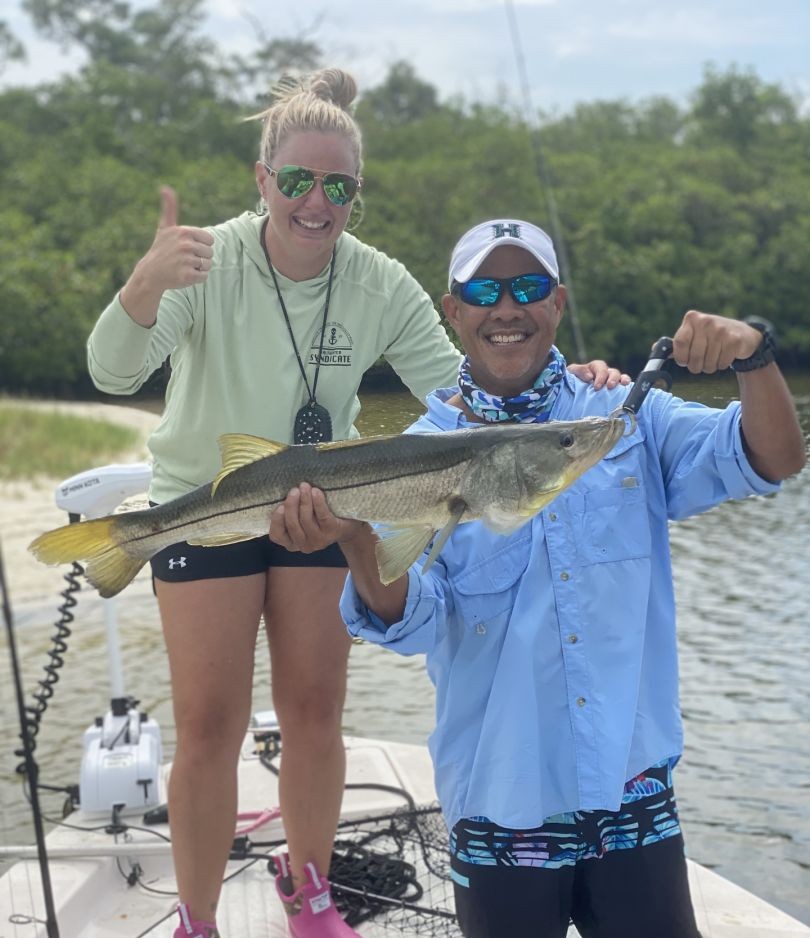 Two anglers fishing for Snook in FL