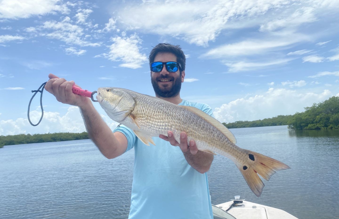 Angler casting fly fishing rod in Florida