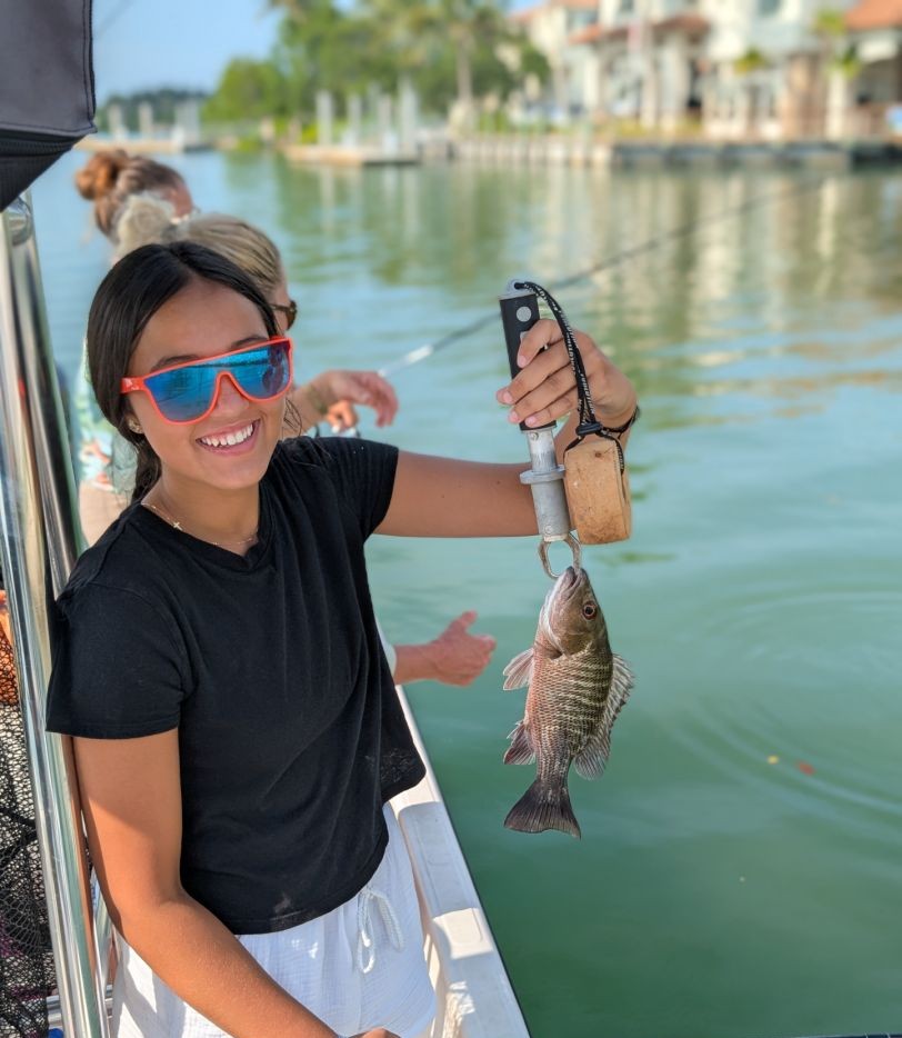 Lone angler enjoying scenic fishing trip in Naples