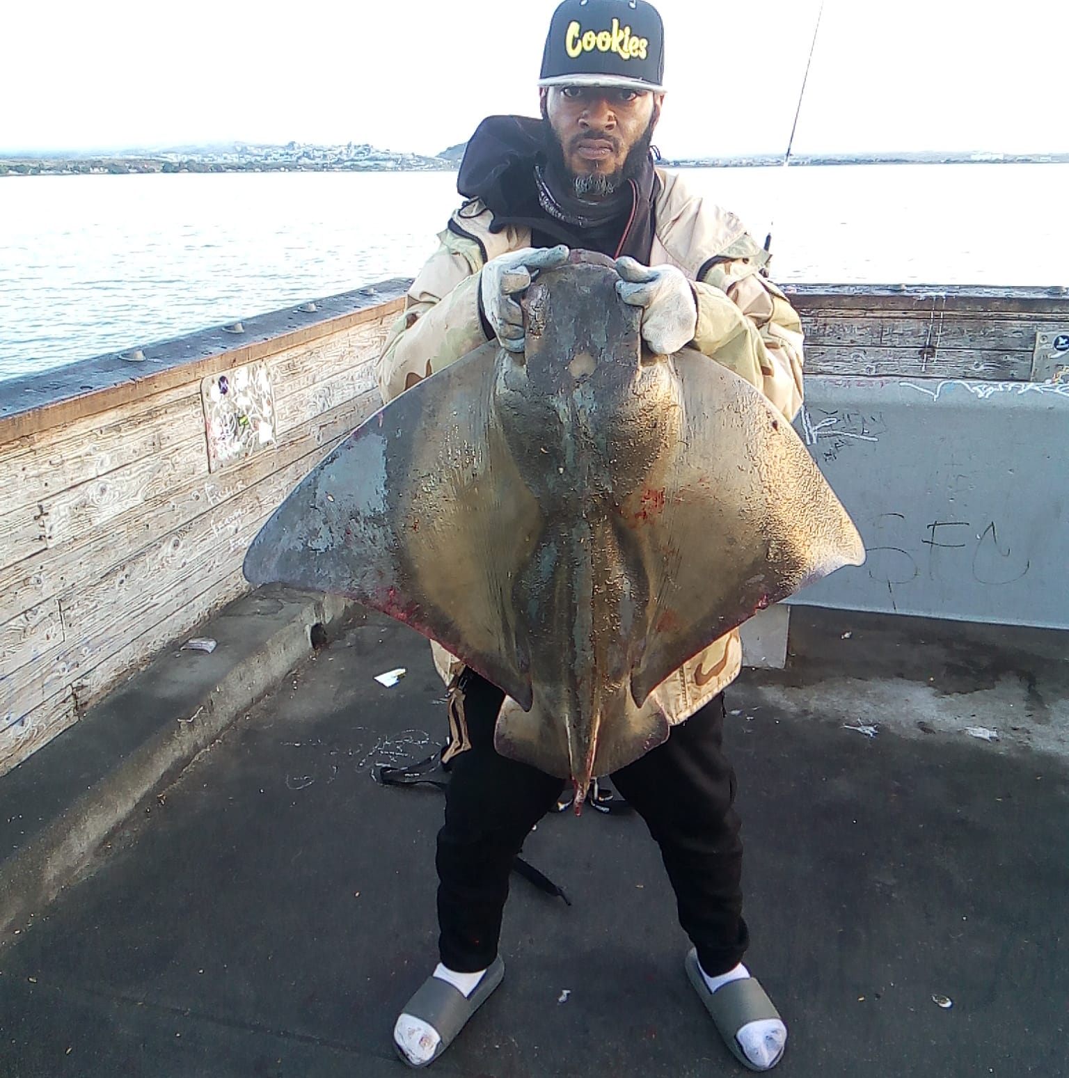 Two people fishing in Oakland