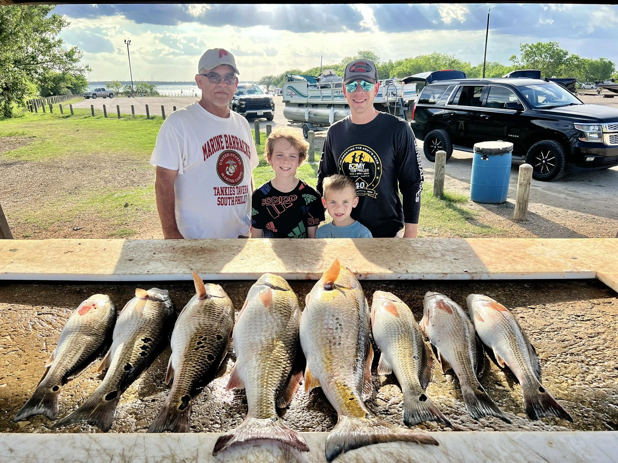 Successful redfish catch displayed on cleaning table at Elmendorf TX fishing location